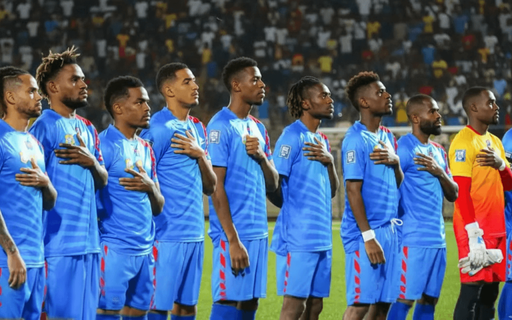 L'équipe nationale de la République Démocratique du Congo posant ensemble avant un match, symbolisant l'unité et la détermination du groupe