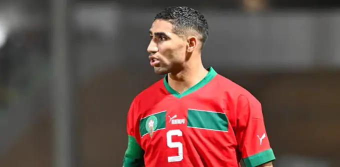 Supporters marocains célébrant la victoire à la Coupe arabe.
