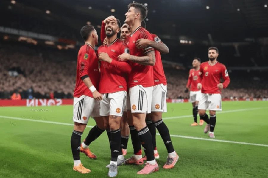 Joueurs de Manchester United célébrant un but.